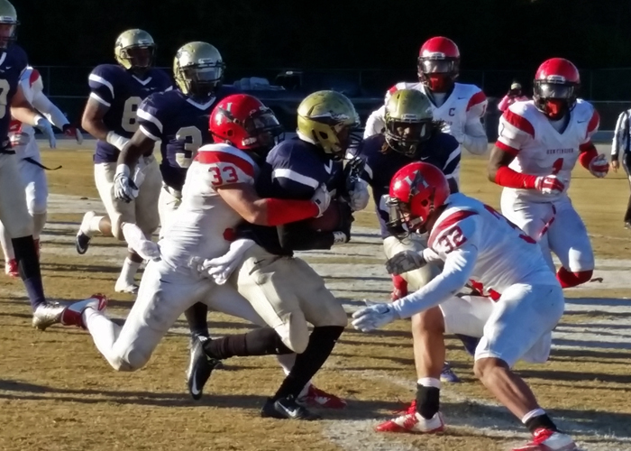 Senior linebacker Zach Brownell (#33) recorded 12 tackles and an interception in Saturday's 37-20 win over N.C. Wesleyan. Brownell finished the season with 99 tackles to set the Hawks' single-season record. (Photo by Eric Levanda)