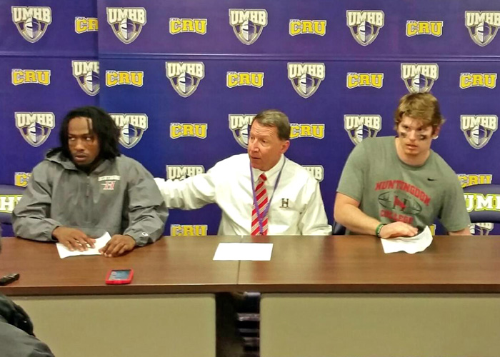 Senior defensive back Brendon Brown (left), head coach Mike Turk and junior quarterback Luke Bailey (right) meet with the media following Saturday's second-round loss at 10th-ranked Mary Hardin-Baylor. (Photo by Chuck Tidmore)