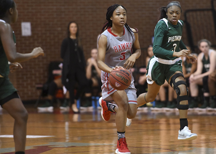 T.I. Duncan turned in a double-double of 21 points and 13 rebounds to help Huntingdon earn its 20th win of the season. (Photo by Julie Bennett / juliebennettphoto.com)