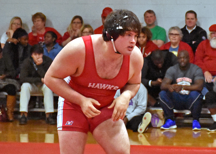 Jesse Rowlen recorded a pin with six seconds left in the 285-pound match to help the Hawks beat Ouachita Baptist  22-21 on Tuesday.