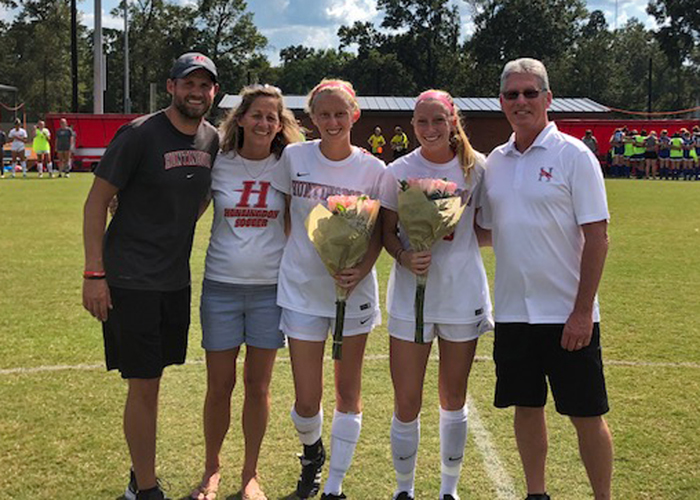 Seniors Jenna Maschino and Meredith Harrison were recognized on Saturday during Senior Day. (Photo by Vic Jerald)
